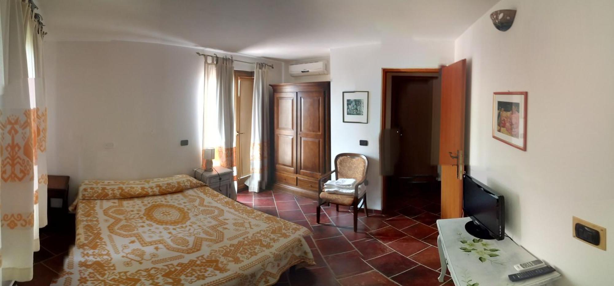 Locanda Tipica Sa Corte Oliena Rum bild